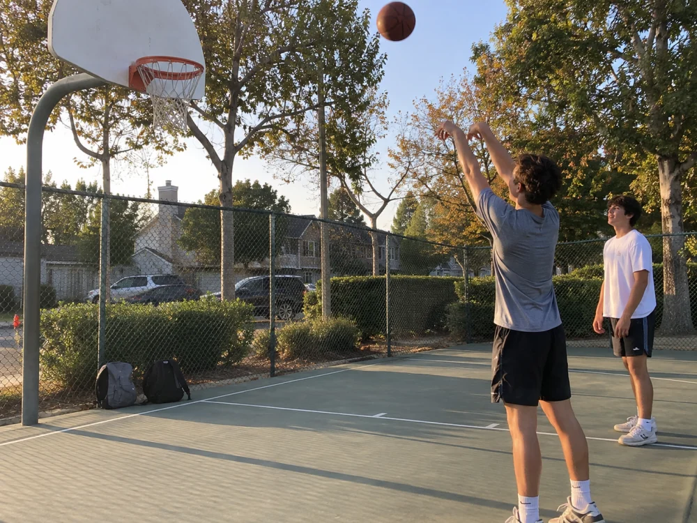 Friends playing basketball after school, from Oliver’s preview post